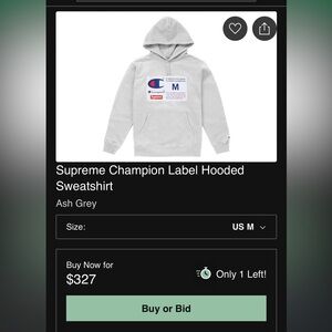 Supreme Champion label hooded sweatshirt.